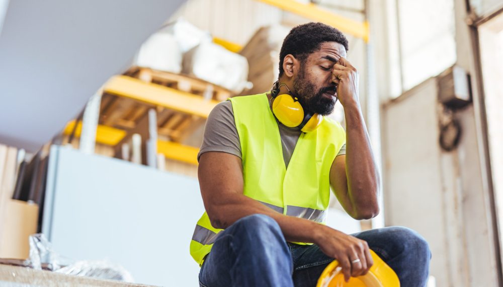 A,Stressed,Industrial,Worker,In,A,Warehouse,,Wearing,High,Visibility A,Stressed,Industrial,Worker,In,A,Warehouse,,Wearing,High,Visibility