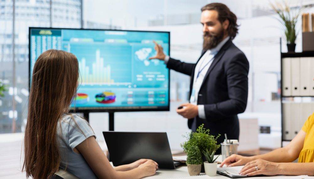 Financial,Advisor,Guiding,Mother,And,Daughter,In,Trading,Shares,And Financial,Advisor,Guiding,Mother,And,Daughter,In,Trading,Shares,And
