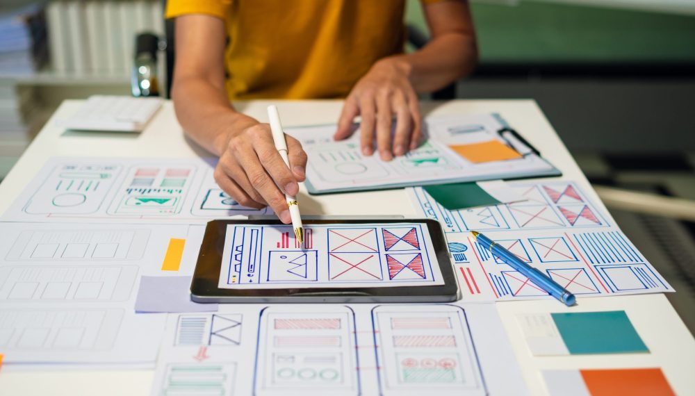 Ux,Developer,And,Ui,Designer,Brainstorming,About,Mobile,App,Interface