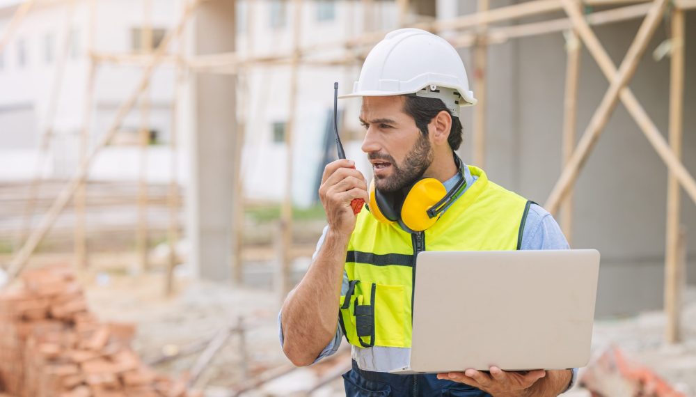 Worker,Foreman,Engineer,Builder,Working,Using,Radio,Command,In,Home