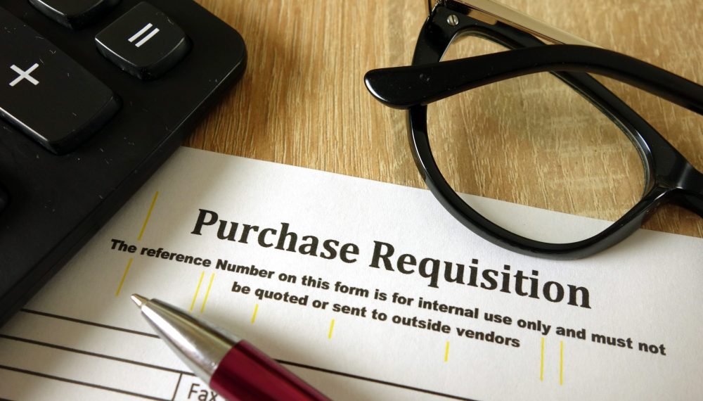 Purchase,Requisition,,Pen,,Calculator,And,Glasses,On,Desk Purchase,Requisition,,Pen,,Calculator,And,Glasses,On,Desk