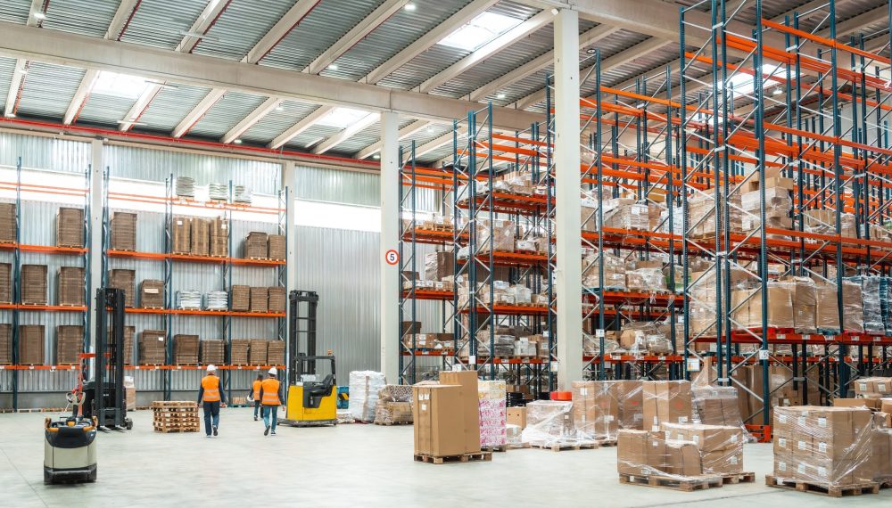 Warehouse,Workers,Are,Managing,Logistics,,Operating,Forklifts,,And,Organizing,Packages