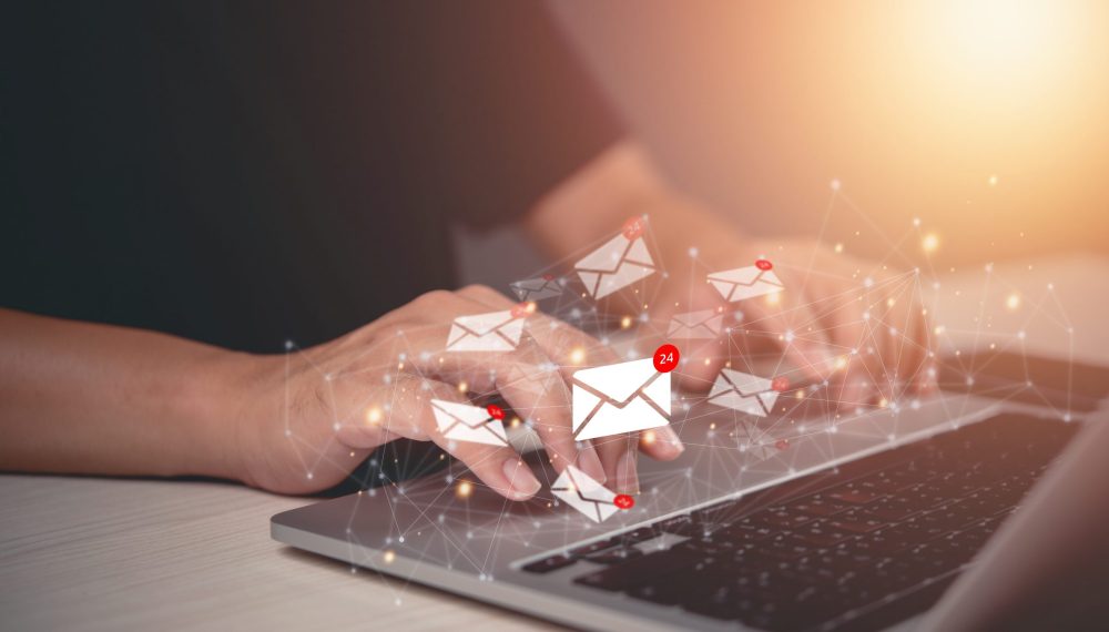 Hands,Typing,On,A,Laptop,With,Digital,Email,Icons,Floating, Hands,Typing,On,A,Laptop,With,Digital,Email,Icons,Floating,