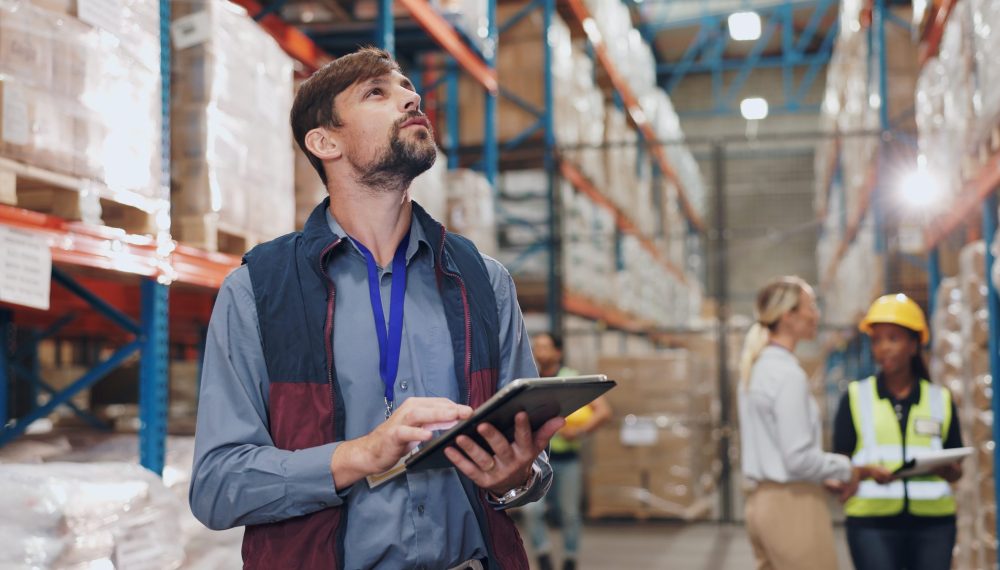 Logistics,,Distribution,And,Man,With,Tablet,In,Warehouse,For,Stock Logistics,,Distribution,And,Man,With,Tablet,In,Warehouse,For,Stock