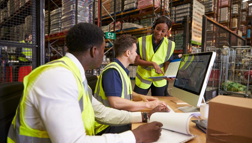 Team,Discussing,Warehouse,Logistics,In,An,On-site,Office Team,Discussing,Warehouse,Logistics,In,An,On-site,Office