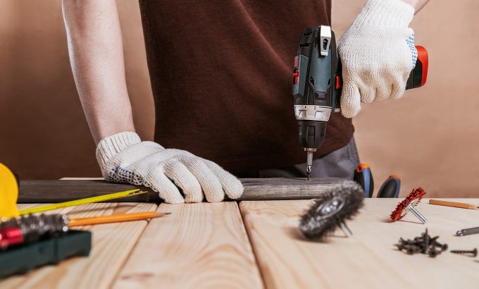 Close,Up,Portrait,And,Details,Of,Caucasian,Male,Worker,Using Close,Up,Portrait,And,Details,Of,Caucasian,Male,Worker,Using