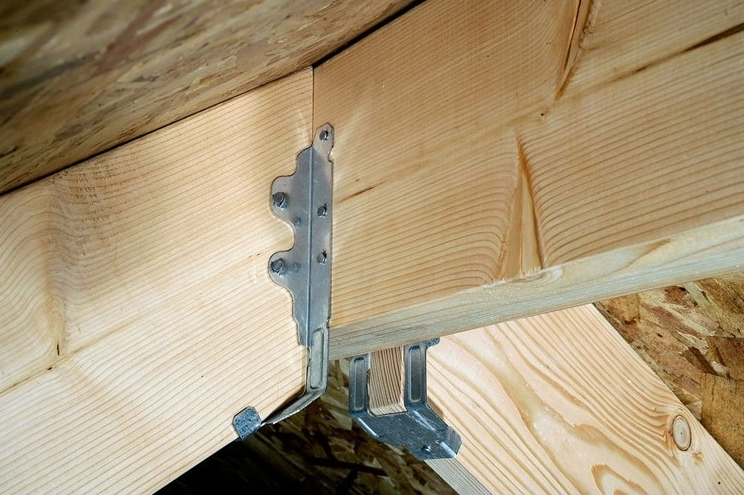 Garage workbench frame construction showing sturdy wooden support brackets